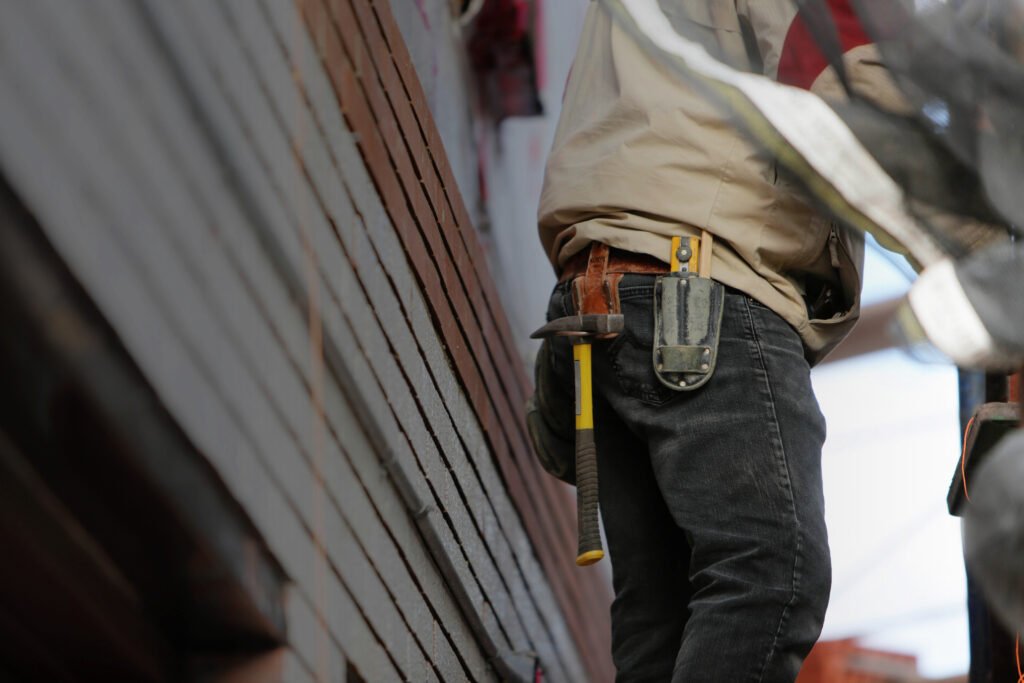 Building maintenance handyman at work